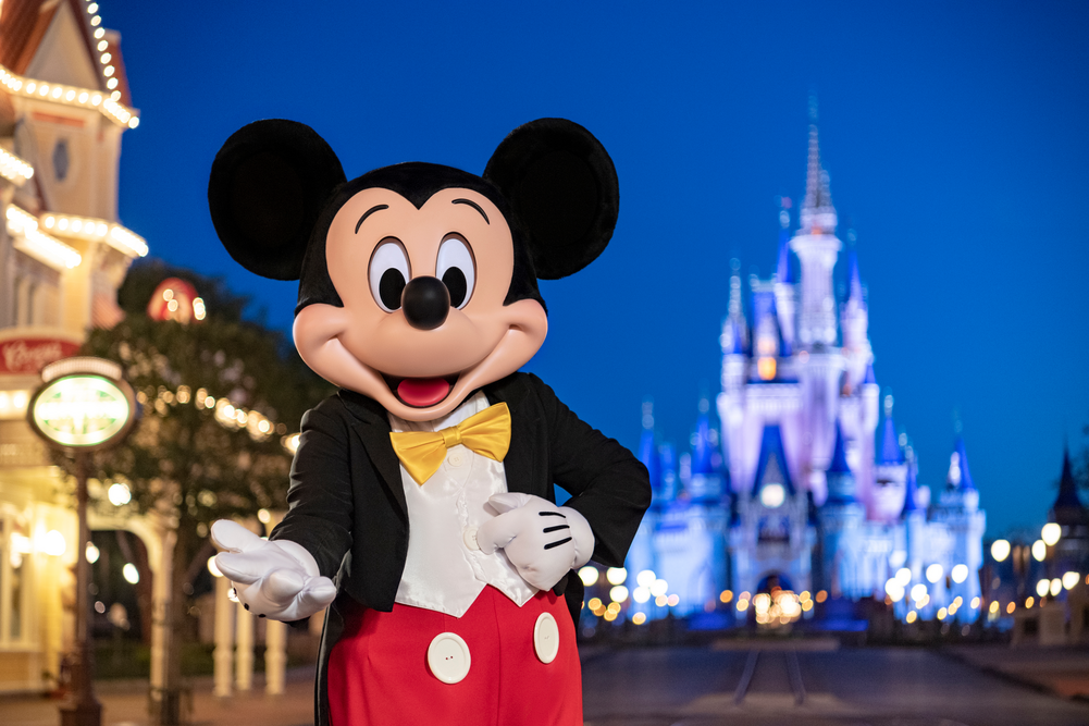 Mickey Mouse on Main Street with Cinderella Castle at Magic Kingdom